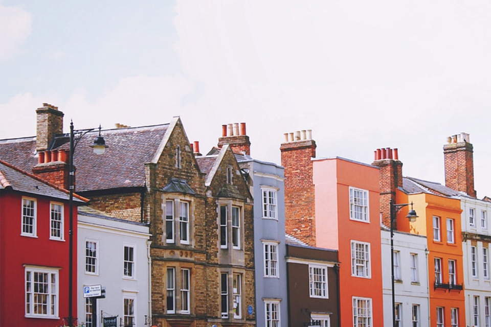 Row of houses, varying in age.