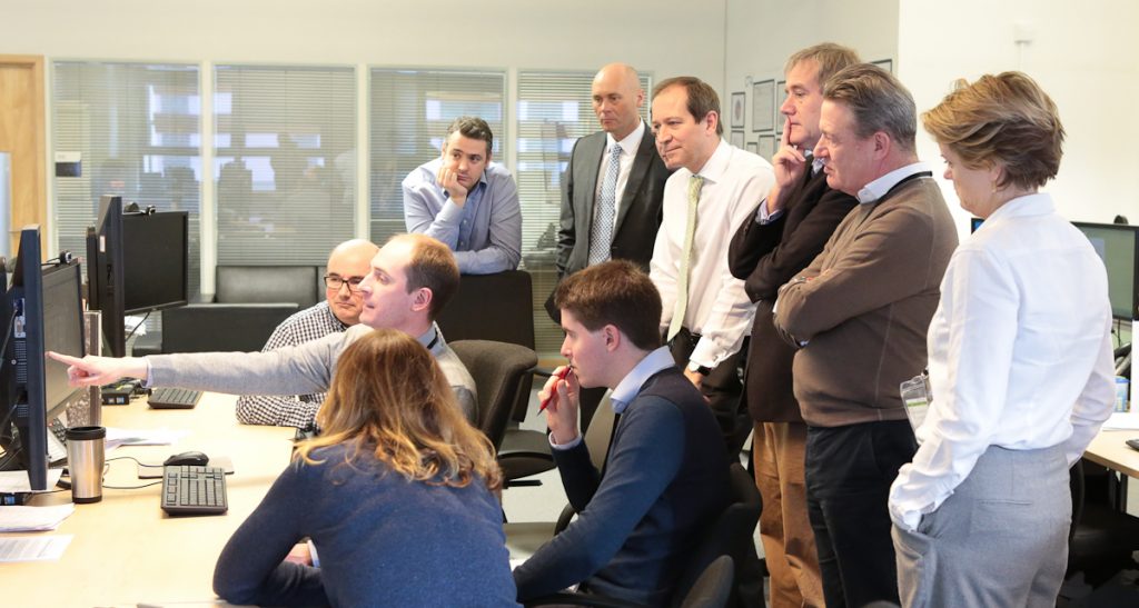 Visitors from GDS, including Kevin Cunnington, and senior HM Land Registry staff watch a casework demonstration.