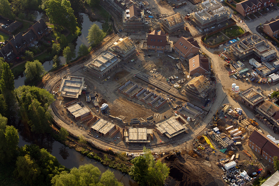 Aerial view of houses being built.