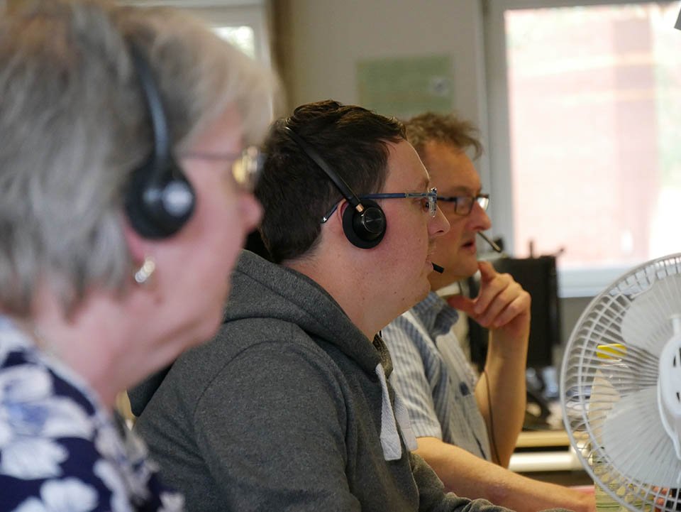 side head view of three people from customer support team