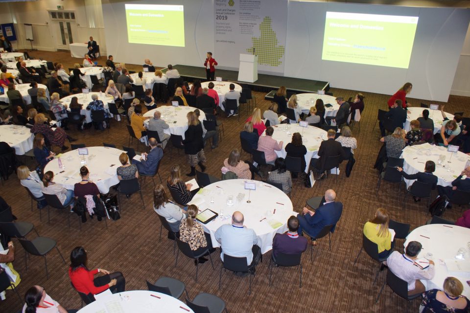 Aerial view of delegates with Kate Faulkner presenting.